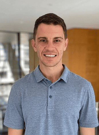 The image is of researcher Dr Matthew Jones, who is wearing a blue shirt
